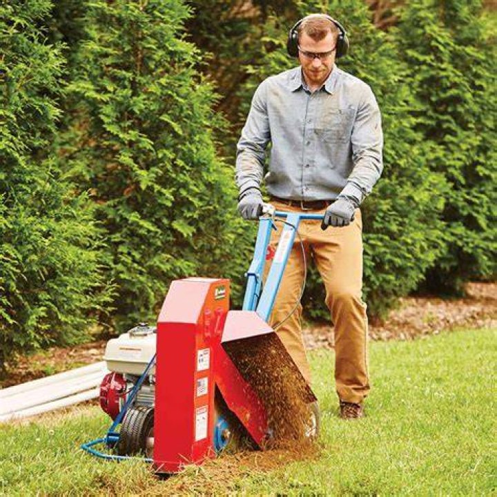 Do you have to dig up grass before mulching