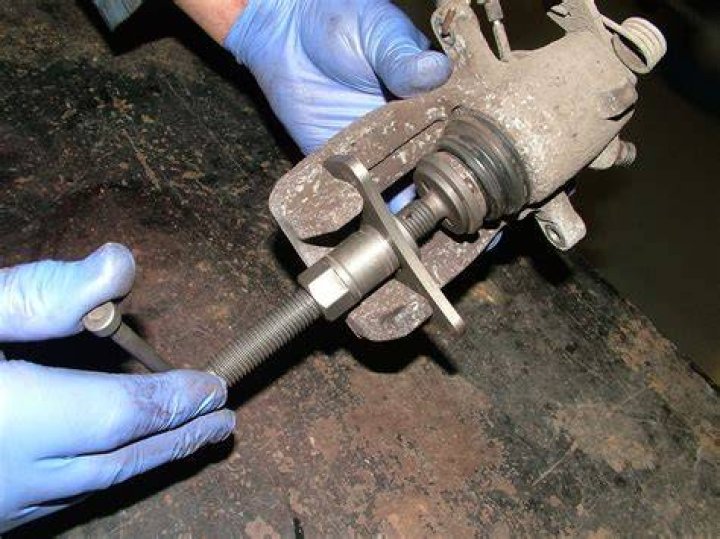 How do you release seized rear brakes?
